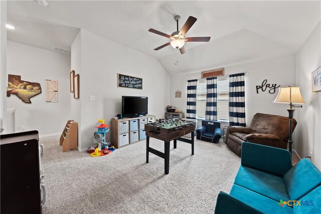 810 Mclaury Cv, Killeen, TX 76542 - living area with ceiling fan, visible vents, vaulted ceiling, baseboards, and carpet flooring