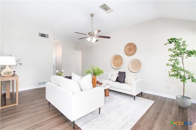 1418 Cedar Ln, Temple, TX 76502 - living room featuring a ceiling fan, wood finished floors, baseboards, and lofted ceiling