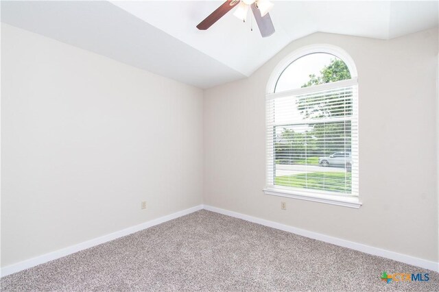 1418 Cedar Ln, Temple, TX 76502 - carpeted empty room with a ceiling fan, lofted ceiling, and baseboards