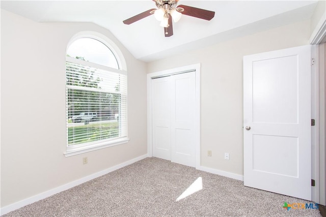1418 Cedar Ln, Temple, TX 76502 - unfurnished bedroom featuring lofted ceiling, a closet, carpet flooring, baseboards, and a ceiling fan
