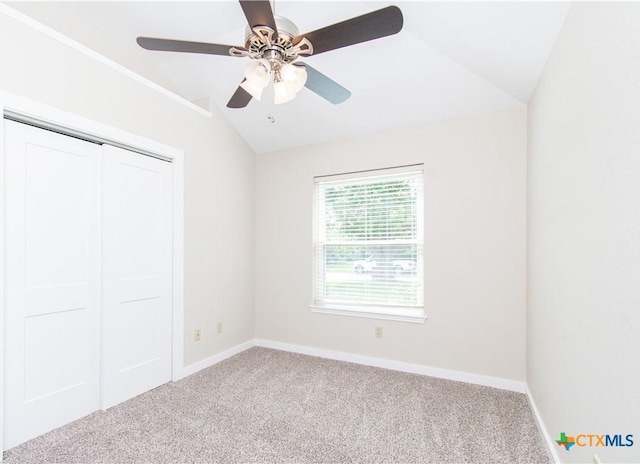 1418 Cedar Ln, Temple, TX 76502 - unfurnished bedroom featuring lofted ceiling, carpet floors, baseboards, a closet, and a ceiling fan