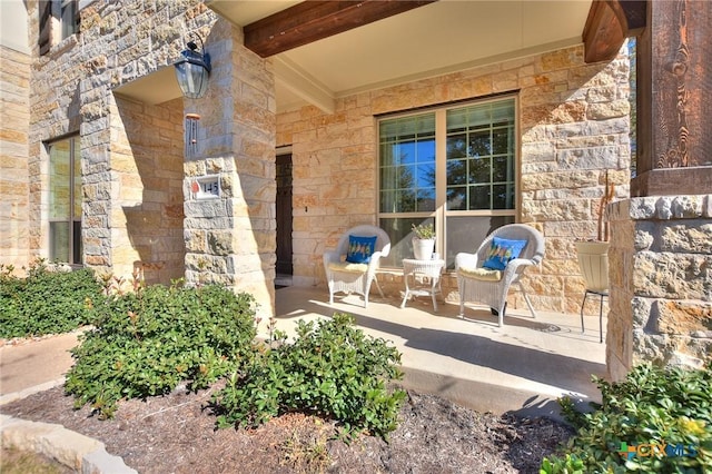 doorway to property featuring a patio area