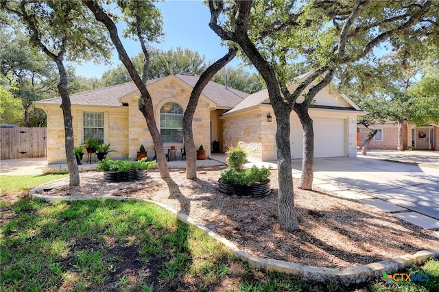 ranch-style house featuring a garage