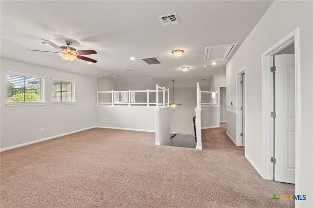 1904 Garretts Way, Manchaca, TX 78652 - empty room featuring attic access, visible vents, and carpet flooring