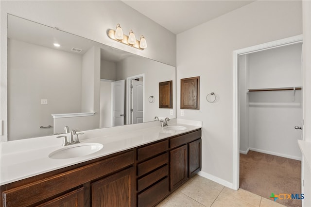 1904 Garretts Way, Manchaca, TX 78652 - full bathroom featuring baseboards, tile patterned flooring, a sink, and double vanity