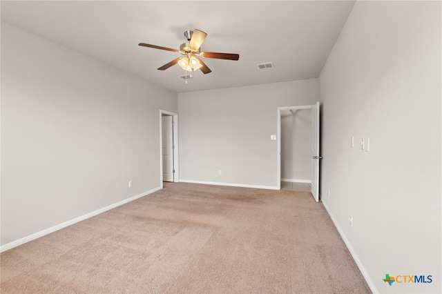 1904 Garretts Way, Manchaca, TX 78652 - unfurnished room with baseboards, visible vents, light colored carpet, and ceiling fan