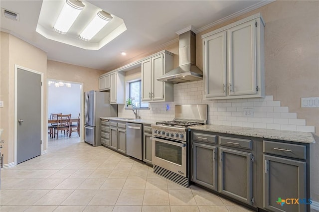 806 Northstar Loop, New Braunfels, TX 78130 - kitchen featuring stainless steel appliances, wall chimney exhaust hood, backsplash, and light tile patterned floors