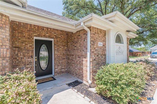 806 Northstar Loop, New Braunfels, TX 78130 - entrance to property featuring brick siding and a shingled roof