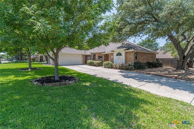 806 Northstar Loop, New Braunfels, TX 78130 - single story home featuring a garage, concrete driveway, and brick siding