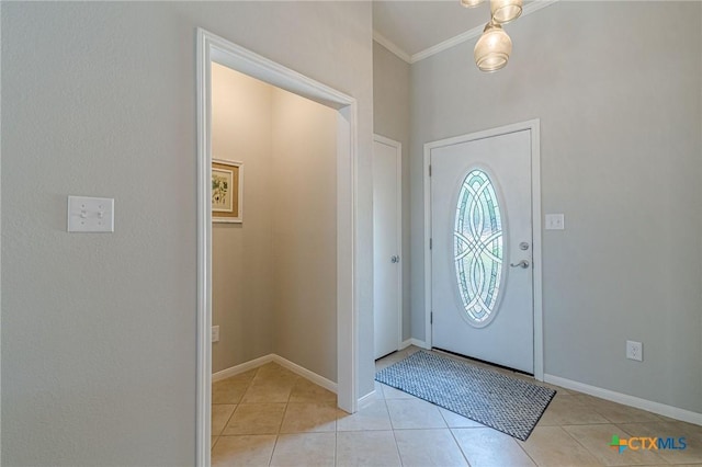 806 Northstar Loop, New Braunfels, TX 78130 - foyer entrance featuring light tile patterned flooring, crown molding, and baseboards