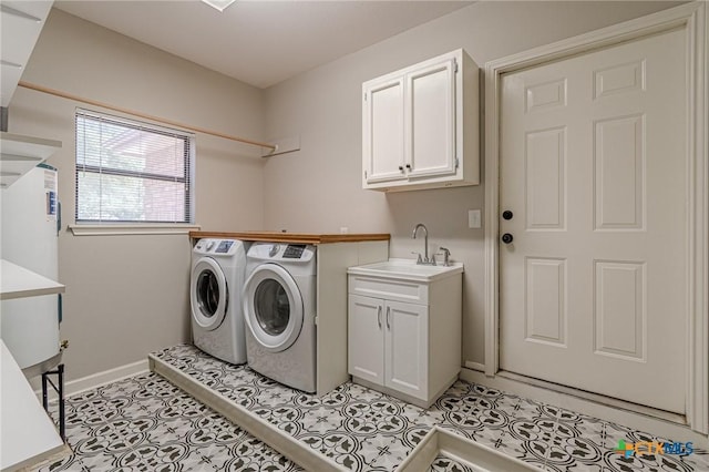 806 Northstar Loop, New Braunfels, TX 78130 - washroom featuring washing machine and dryer, cabinet space, and baseboards