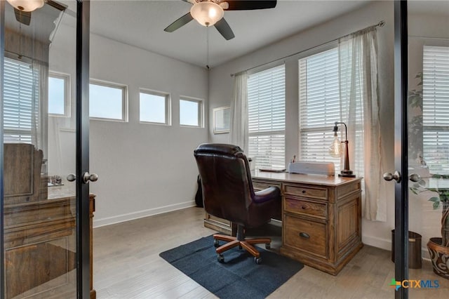 1531 Esser Xing, Canyon Lake, TX 78132 - home office with ceiling fan, french doors, and light wood-style flooring