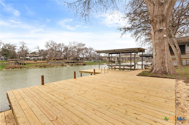 dock area with a water view