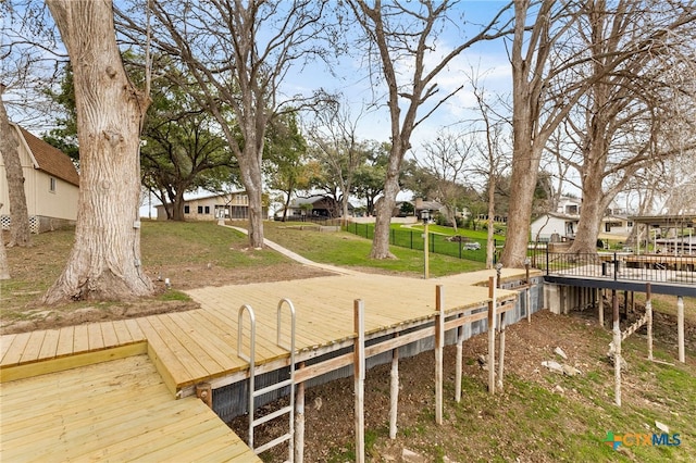 dock area with a lawn