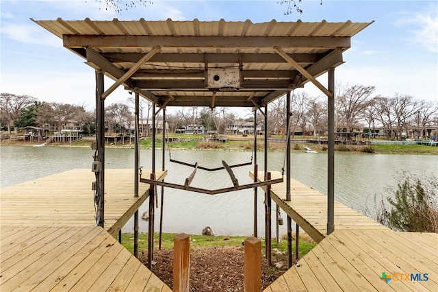 dock area with a water view