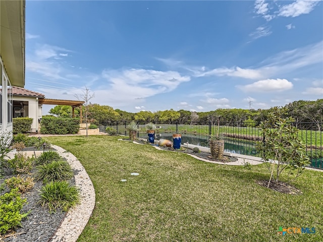 view of yard with a water view