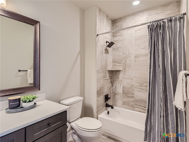 full bathroom with vanity, toilet, and shower / bath combo with shower curtain