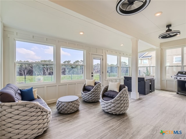 sunroom / solarium with plenty of natural light