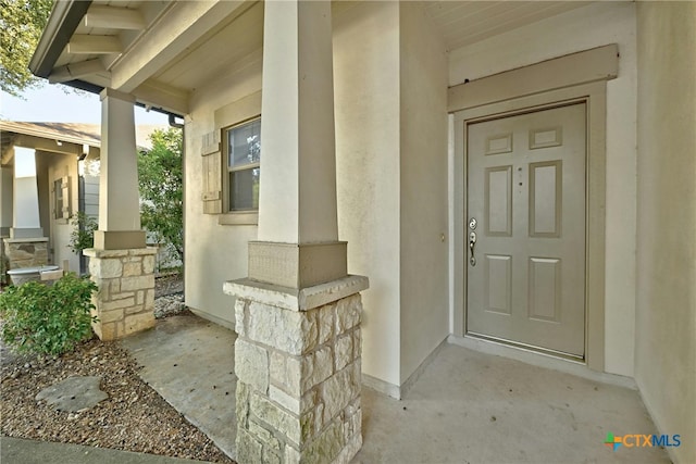 property entrance with a porch