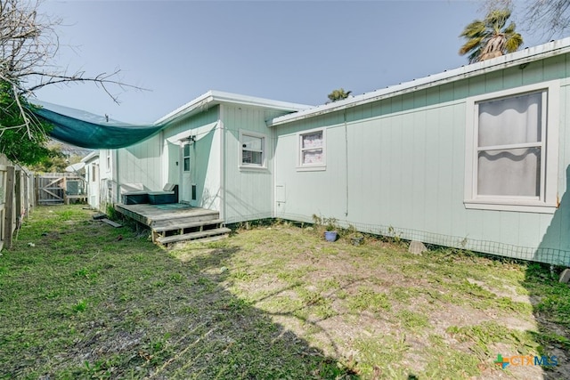 243 E Magnolia Ave, Aransas Pass, TX 78336 - view of side of home featuring a fenced backyard