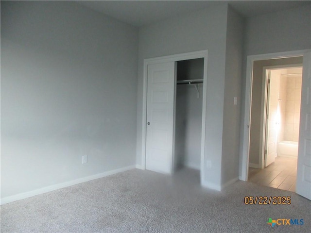 336 Mclintock Rd, Jarrell, TX 76537 - unfurnished bedroom featuring carpet floors, baseboards, and a closet