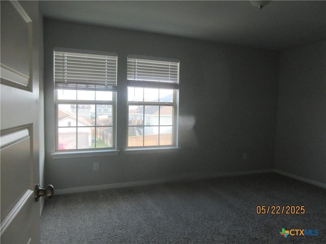 336 Mclintock Rd, Jarrell, TX 76537 - empty room with carpet, plenty of natural light, and baseboards