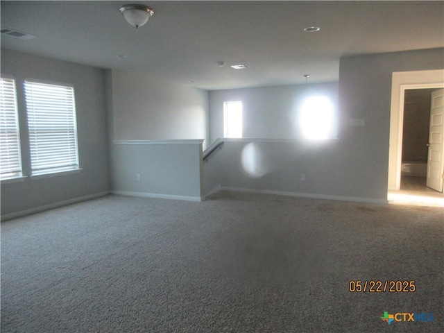 336 Mclintock Rd, Jarrell, TX 76537 - unfurnished room featuring carpet, baseboards, and recessed lighting