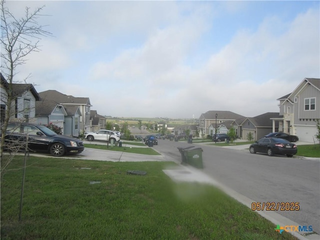 336 Mclintock Rd, Jarrell, TX 76537 - view of asphalt street featuring a residential view