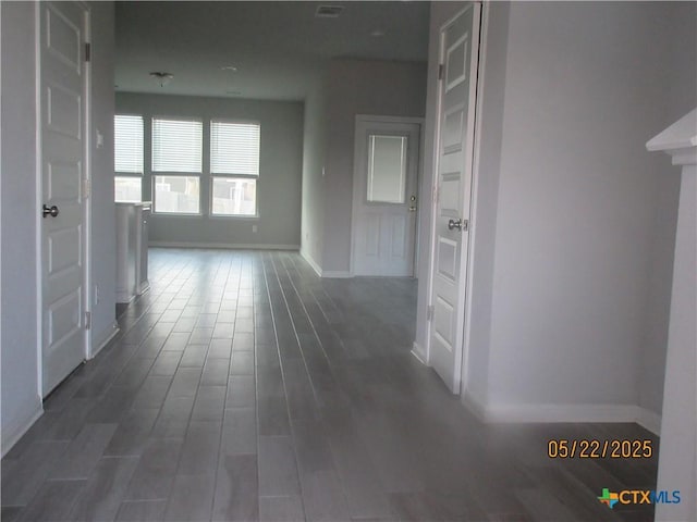 336 Mclintock Rd, Jarrell, TX 76537 - hall featuring baseboards and dark wood-type flooring