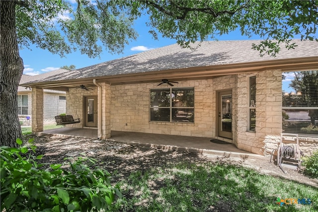 back of property featuring a patio area and ceiling fan