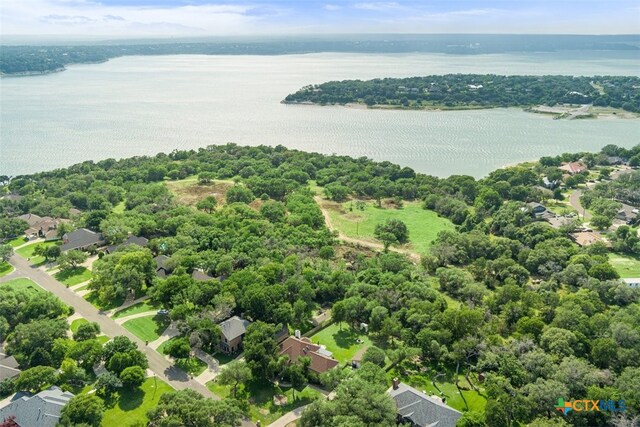 birds eye view of property with a residential view and a water view