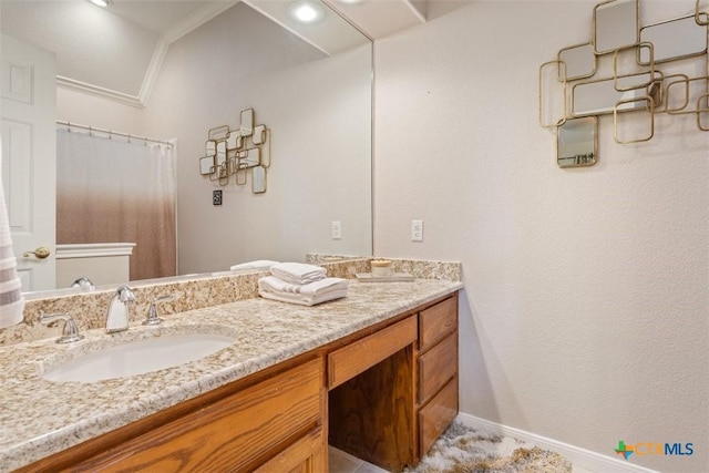 full bath with vanity, ornamental molding, baseboards, and a shower with curtain