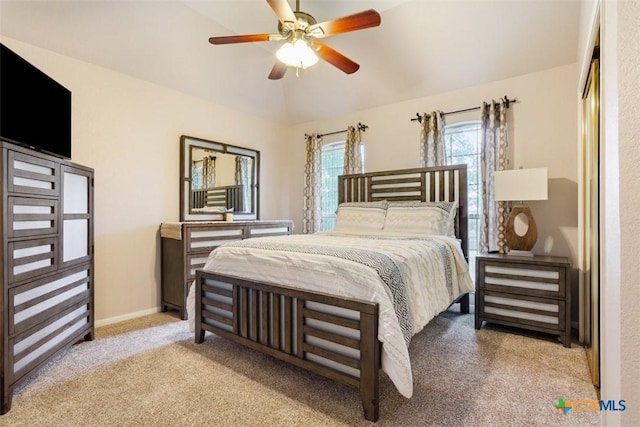 carpeted bedroom featuring a ceiling fan