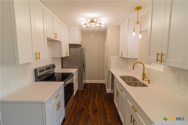 kitchen featuring white cabinetry, stainless steel appliances, and sink