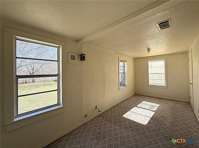201 Dewald St, Copperas Cove, TX 76522 - carpeted spare room featuring a textured ceiling and healthy amount of natural light