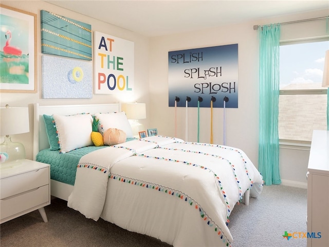 bedroom with carpet flooring and multiple windows