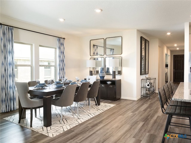 dining room featuring hardwood / wood-style flooring