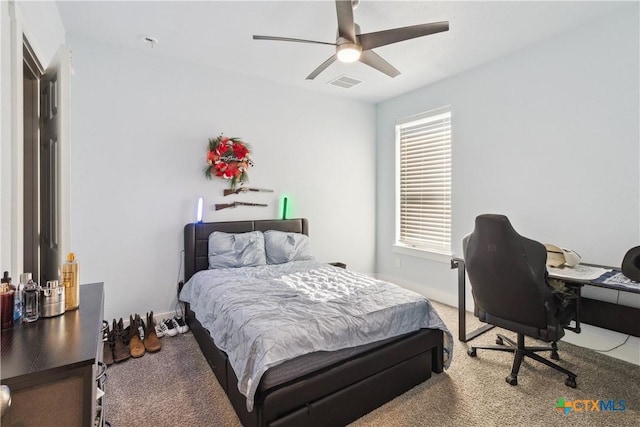 carpeted bedroom with ceiling fan