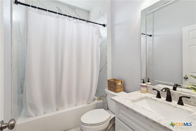 full bathroom with toilet, vanity, and shower / bath combo