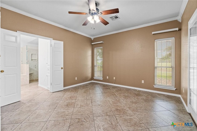 spare room with ceiling fan, baseboards, crown molding, and visible vents