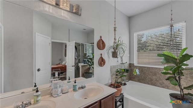 1944 Eastern Finch, New Braunfels, TX 78130 - full bath with a garden tub, double vanity, and a shower stall