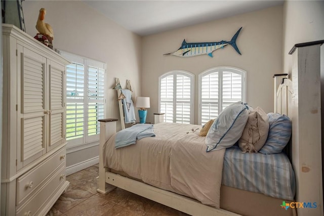 261 E Burgundy Bay Prt, Oconnor, TX 77982 - bedroom featuring tile patterned floors