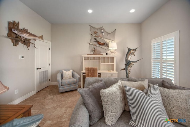 261 E Burgundy Bay Prt, Oconnor, TX 77982 - living area featuring baseboards and recessed lighting