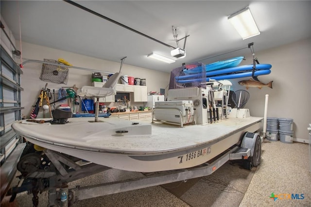 261 E Burgundy Bay Prt, Oconnor, TX 77982 - garage with a garage door opener