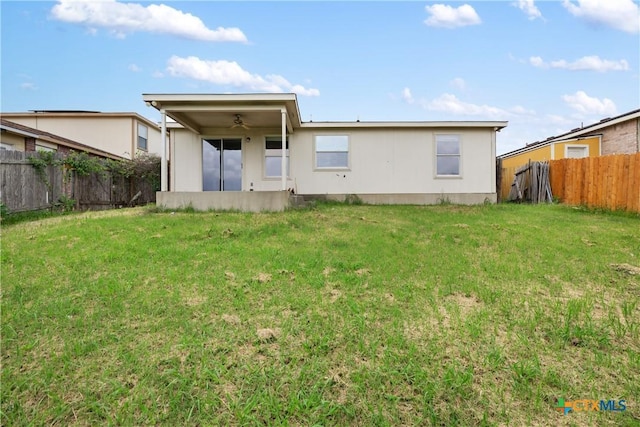 6008 Horne Dr, Killeen, TX 76542 - rear view of property with a sunroom, a ceiling fan, a yard, and a fenced backyard