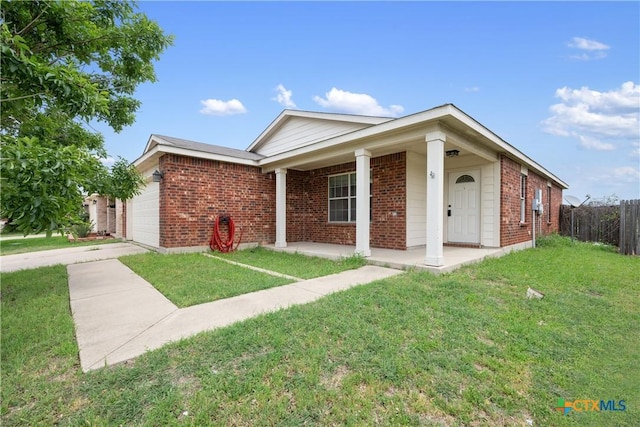 6008 Horne Dr, Killeen, TX 76542 - single story home featuring fence, a front yard, an attached garage, and brick siding