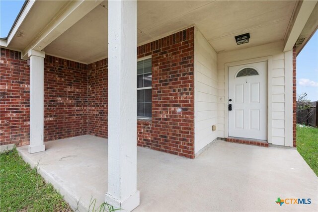 6008 Horne Dr, Killeen, TX 76542 - entrance to property featuring covered porch and brick siding