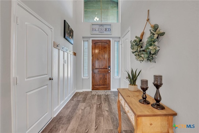 5010 Fallen Tree Dr, Temple, TX 76502 - entryway with wood finished floors, a towering ceiling, and baseboards