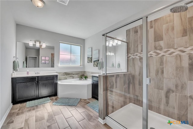 5010 Fallen Tree Dr, Temple, TX 76502 - bathroom featuring a shower stall, a bath, and vanity