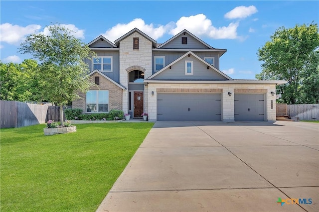 5010 Fallen Tree Dr, Temple, TX 76502 - craftsman-style home featuring driveway, a garage, and stone siding